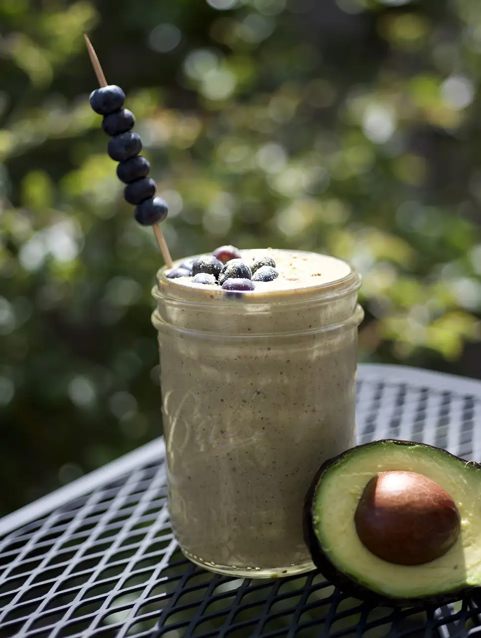 Healthy avocado blueberry smoothie for swimmers after a swim workout