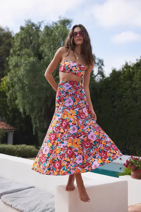 Hermoza brand two piece stylish dress in flower pattern for resort wear worn by woman