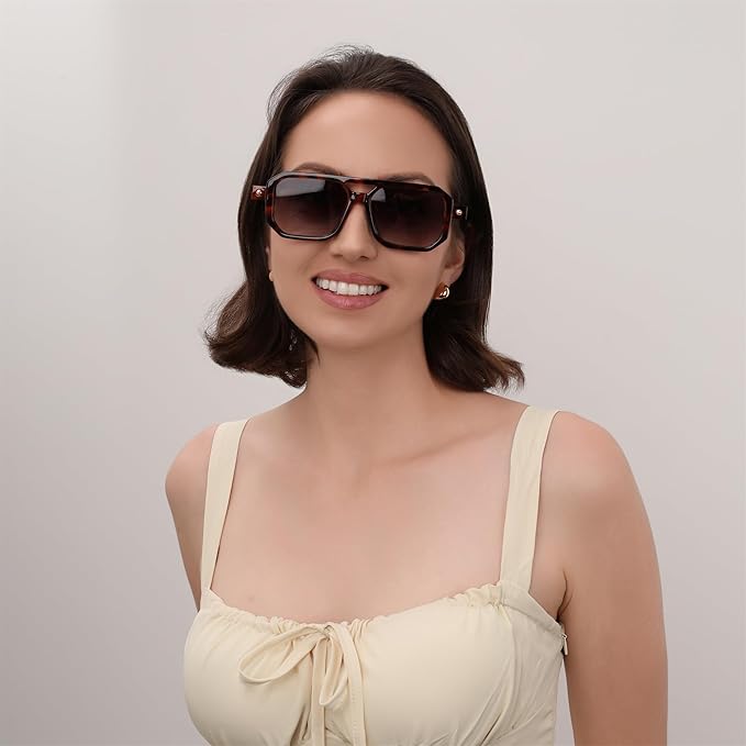 Woman wearing stylish 70s sunglasses for the beach and summer