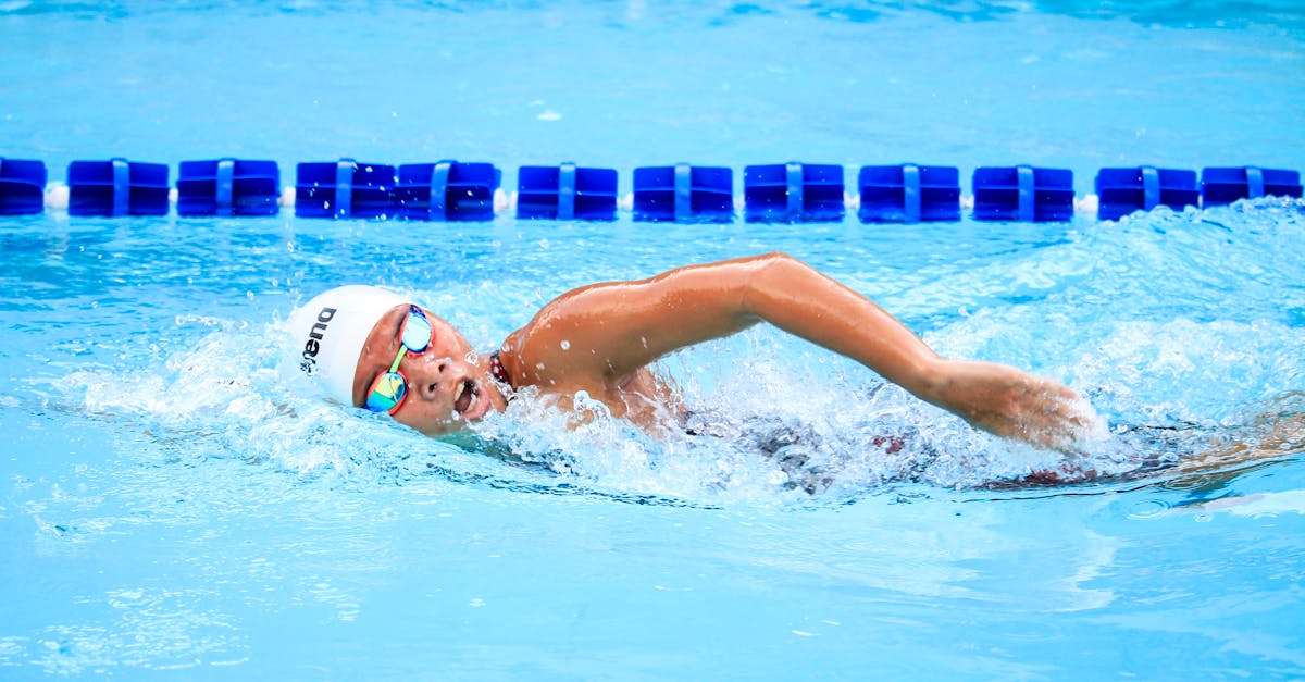 Female Swimming laps in swimming pool