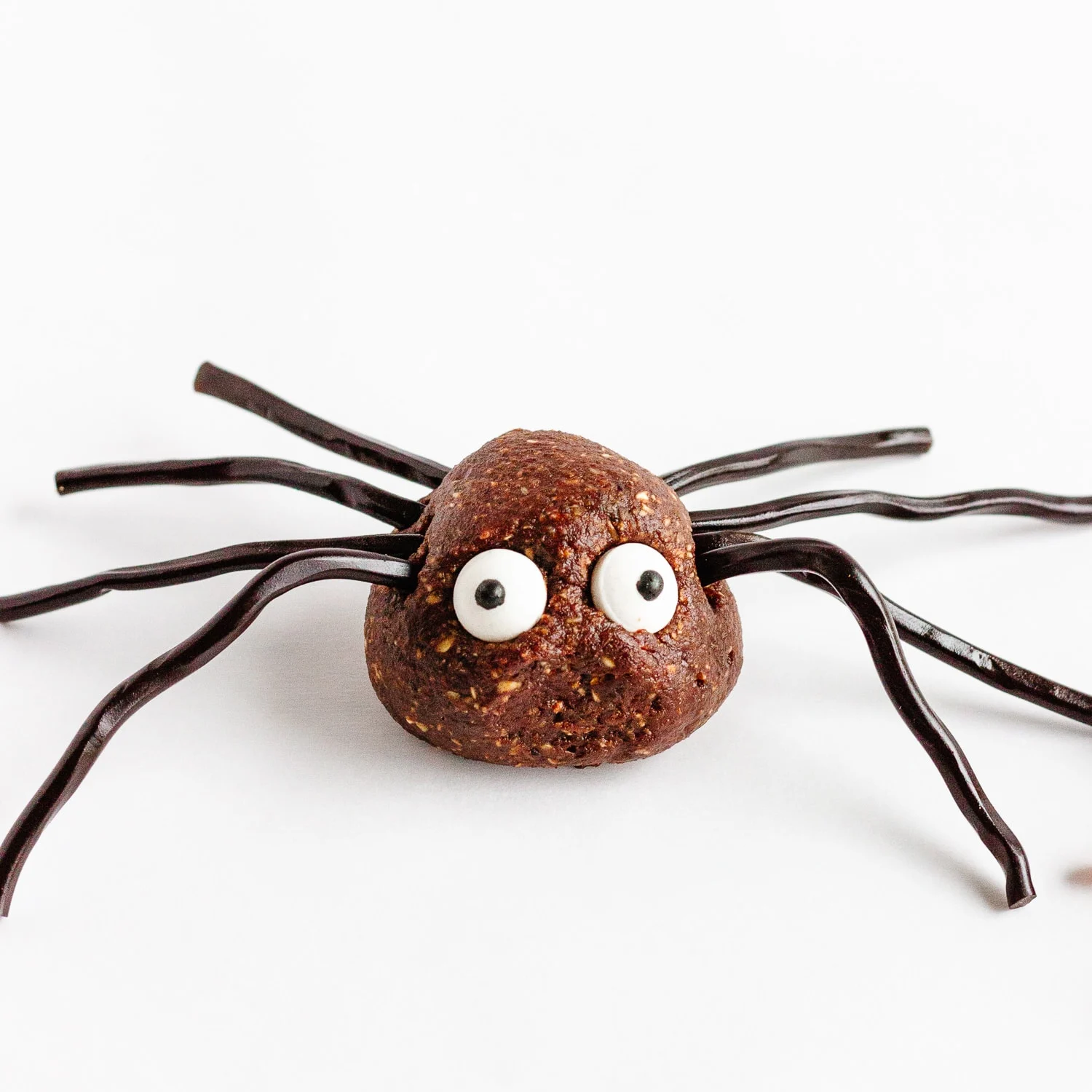 chocolate Power Balls decorated like spiders for halloween